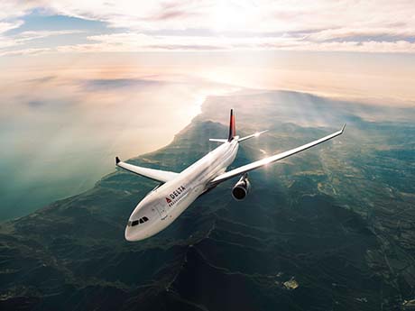 Airplane above the clouds