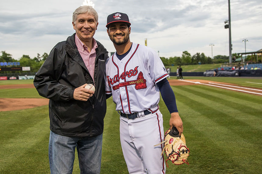 Dean of the Consular Corps, Consul General Miguel Aleman of Peru, throws out the first pitch at the Rome Braves baseball game