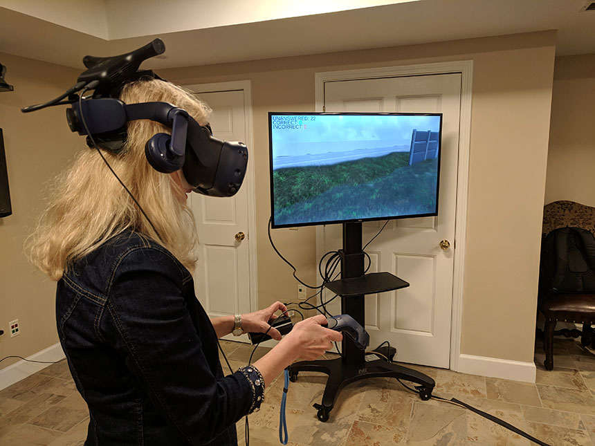 Consul General Heike Fuller of Germany tries out VR technology developed at Kennesaw State University