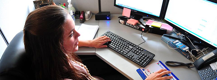 woman researching on the computer about small businesses in georgia
