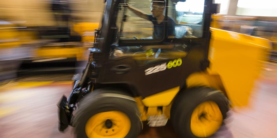 A forklift drives through a Georgia manufacturing facility