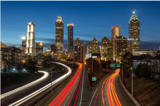 TImelaps of traffic at night in front of downtown Atlanta