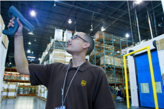 employee scanning in warehouse