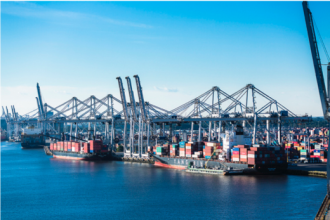 Large cargo ships in a shipping yard